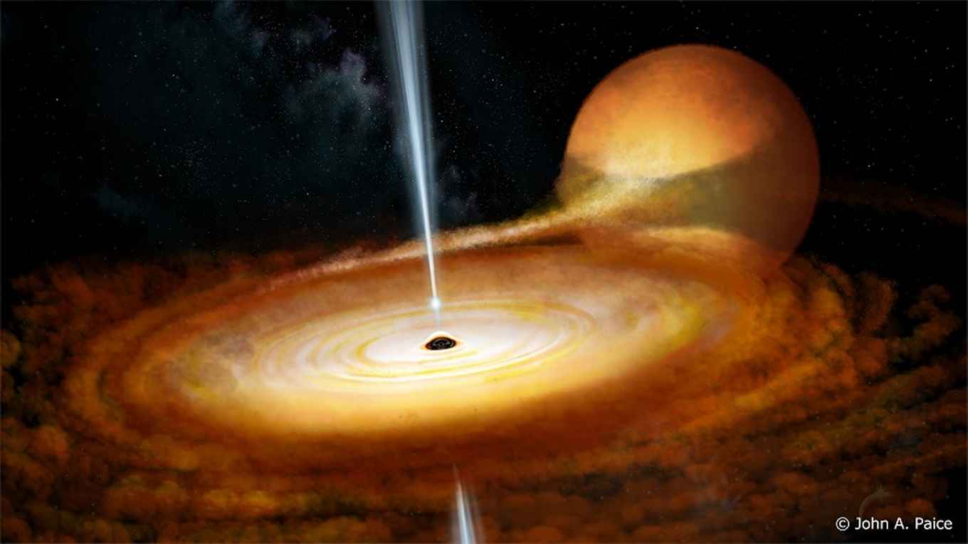 Stilstaand beeld van het flitsende zwarte gat met bijbehorende ster MAXI J1820+070