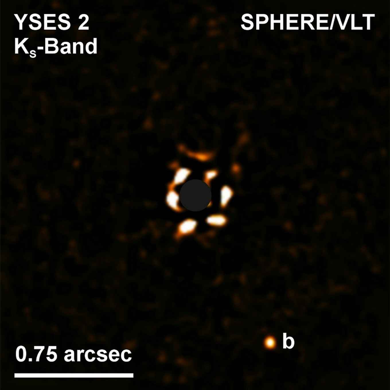 A direct image of the exoplanet YSES 2b (bottom right) and its star (centre). The star is blocked by a so-called coronagraph.